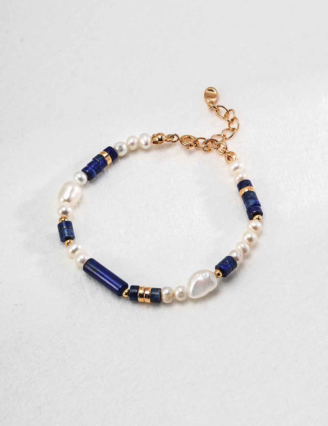 Lapis Lazuli and pearl bracelet in blue and white – energy jewelry by RXYJewelry