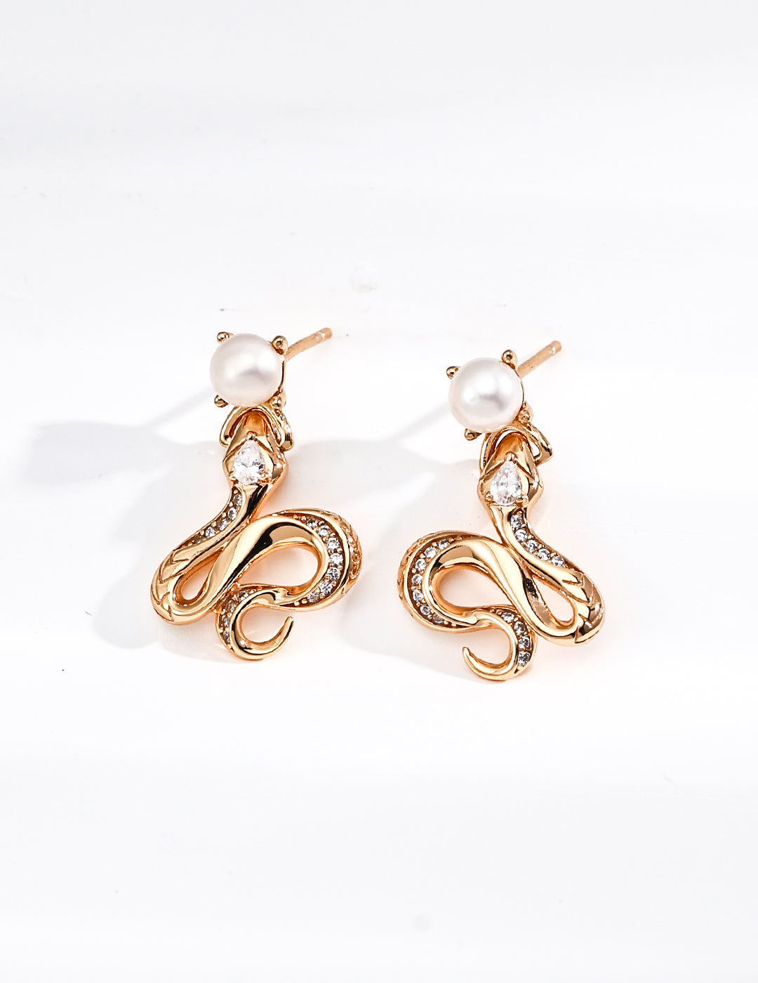 RXY Silver Vintage Pearl and Zirconia Serpent Earrings with silver setting