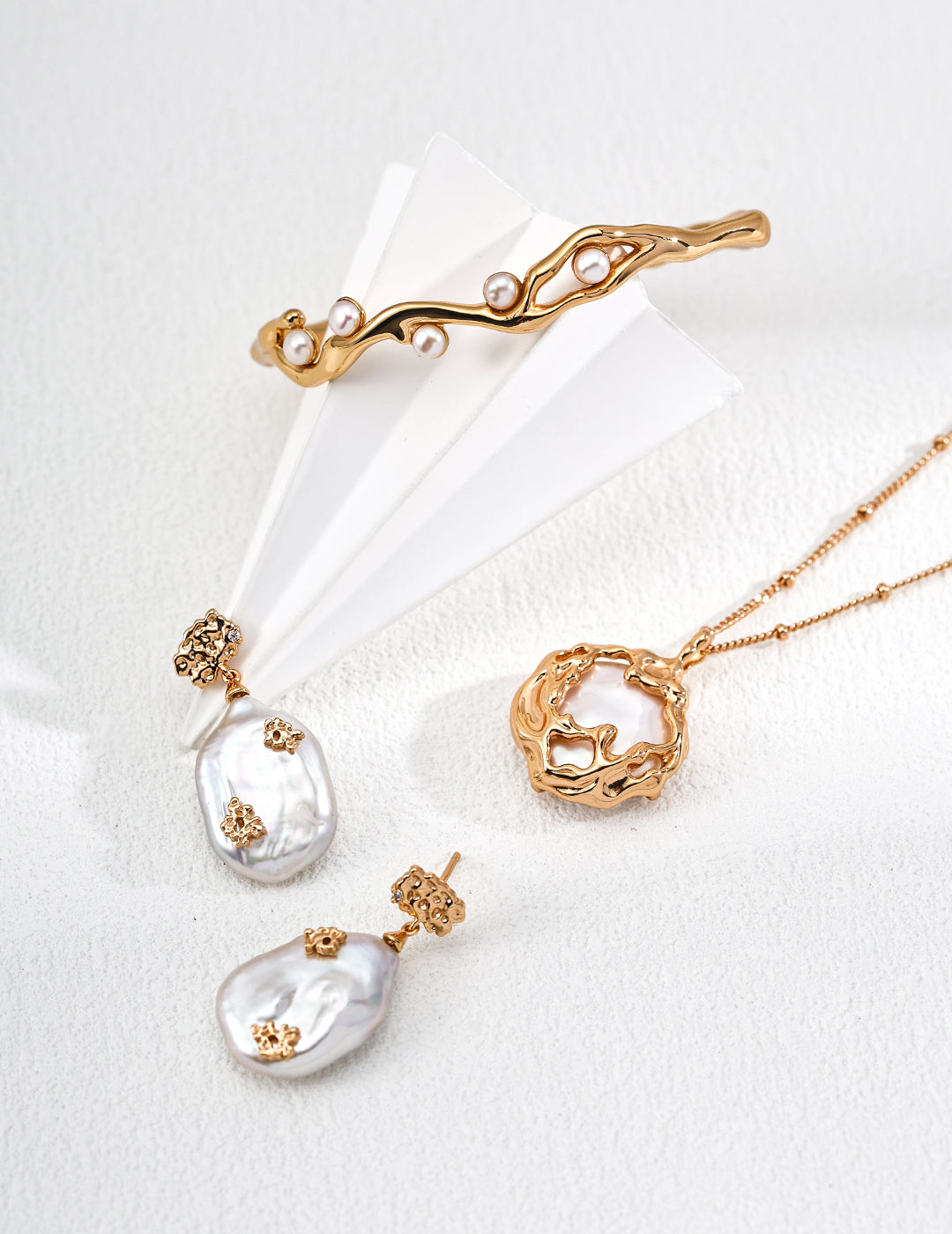 Handcrafted pearl earring detail – S925 silver, zirconia, and baroque pearl