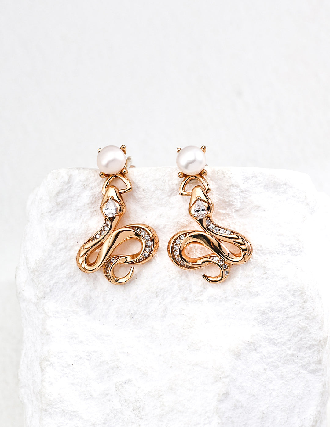 RXY Silver Vintage Pearl and Zirconia Serpent Earrings with silver setting